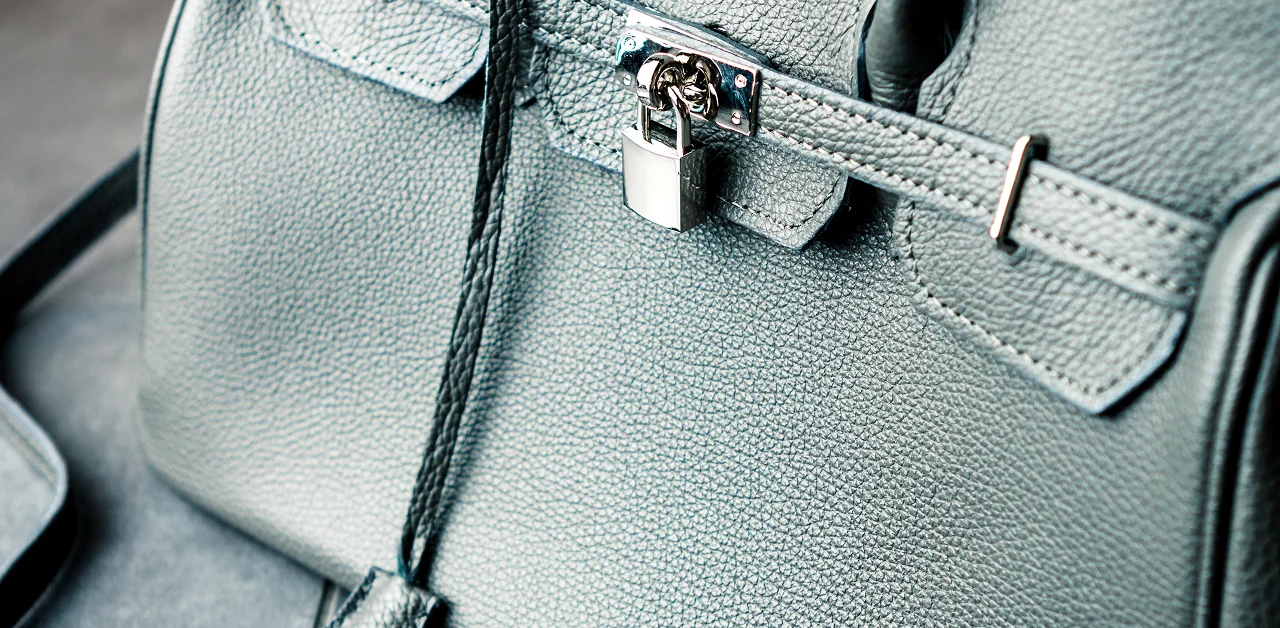 Leather Handbag Repair and Purse Restoration Leather handbag undergoing professional purse repair, strap restoration, and color refinishing